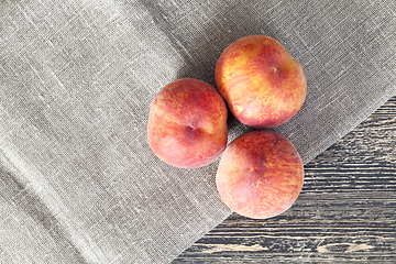 Image showing three peaches