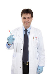 Image showing Doctor with dose of medicine in syringe