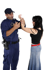 Image showing Handcuffing a ciminal