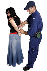 Image showing An officer apprehending a female