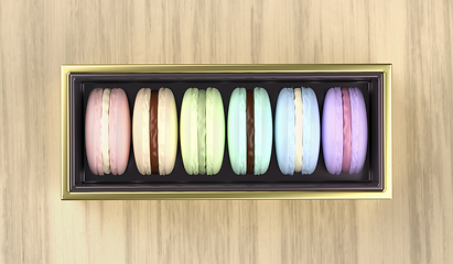 Image showing Golden box with french macarons