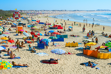 Image showing People rest ocean beach. Portugal