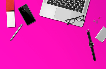 Image showing Office desk mockup top view isolated on magenta pink