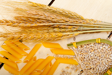 Image showing Italian pasta penne with wheat