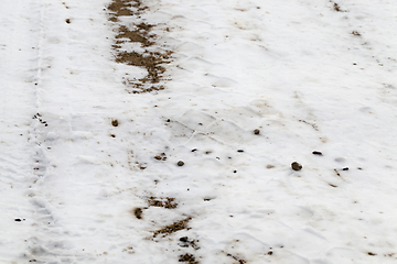 Image showing Snow drifts in winter road