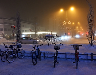 Image showing night landscape in a small finnish town with christmas lights