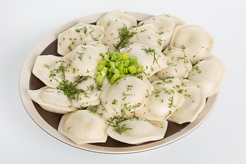 Image showing Vareniki or dumplings, pierogi before boiling - traditional Ukrainian food