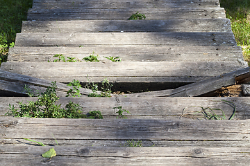 Image showing old break wooden staircase