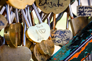 Image showing Love Paris Padlocks hanging on a fence