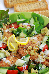 Image showing Green salad with chicken stripes