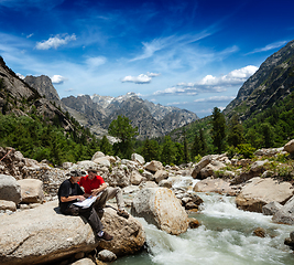 Image showing Hikers with map