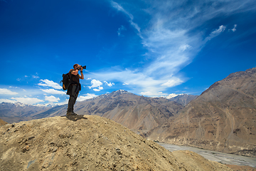 Image showing Photographer taking photos in Himalayas