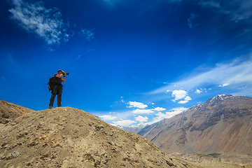 Image showing Photographer taking photos in Himalayas