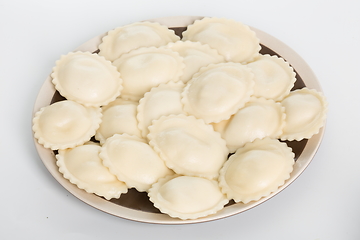 Image showing Vareniki or dumplings, pierogi before boiling - traditional Ukrainian food
