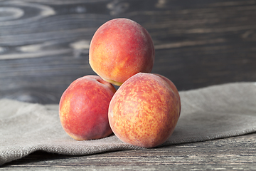 Image showing three peaches