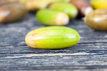 Image showing colored yellow and brown acorns