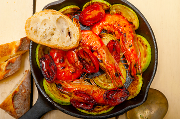 Image showing roasted shrimps with zucchini and tomatoes