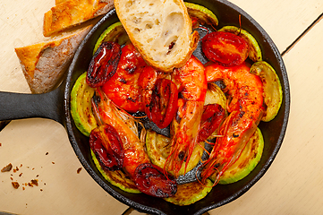 Image showing roasted shrimps with zucchini and tomatoes