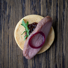 Image showing cookie with roasted duck fillet and red onion jam