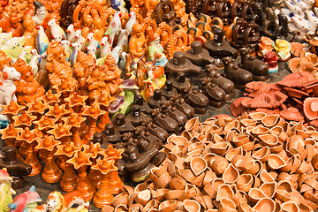 Image showing Clay toys and accessories for pooja (temple worship). Tiruvannam