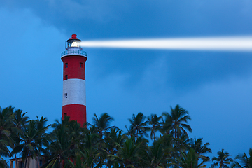 Image showing Lighthouse in night with light beam