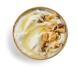 Image showing greek yogurt with honey syrup and nuts