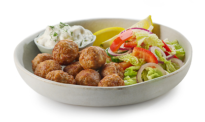 Image showing plate of meat balls and vegetable salad