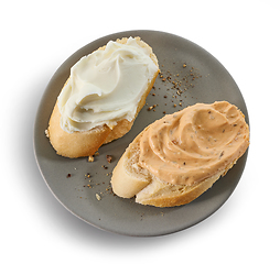 Image showing two baguette slices with cream cheese