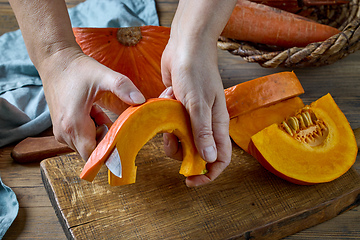 Image showing peeling fresh pumpkin