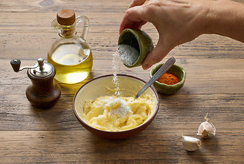 Image showing adding salt to whipped butter