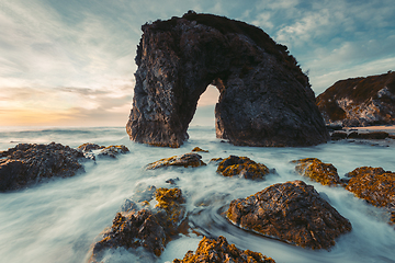 Image showing Ocean waves flow around coast and  Horse Head Rock Australia