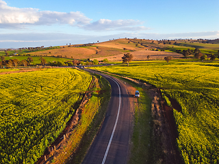 Image showing Beautiful morning sunlight on country fields and hills