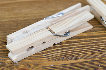 Image showing wooden clothes pegs