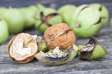 Image showing Walnuts on a wooden table