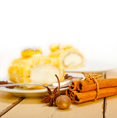 Image showing cream roll cake dessert and spices