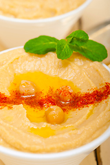 Image showing Hummus with mint on top