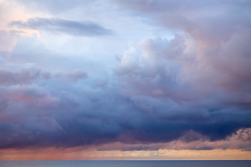 Image showing stormy clouds at sunset