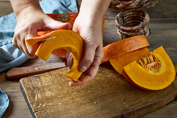Image showing peeling fresh pumpkin