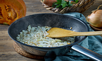 Image showing sliced sweet onion on frying pan