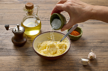 Image showing adding salt to whipped butter