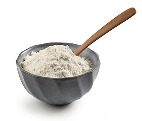 Image showing bowl of flour and wooden spoon