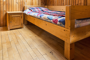 Image showing Bedroom in a Wooden Chalet