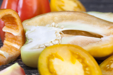 Image showing half-sliced peppers