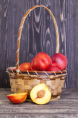 Image showing basket of ripe peaches