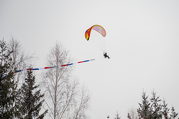 Image showing Paraglider is flying in the sky