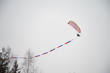 Image showing Paraglider is flying in the sky