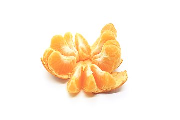 Image showing Tasty tangerine slices, closeup, isolated on white