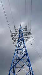 Image showing High voltage tower against the cloudy sky