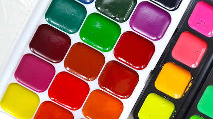 Image showing Bright colorful watercolor paints