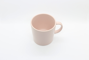 Image showing Empty pink mug isolated on white background